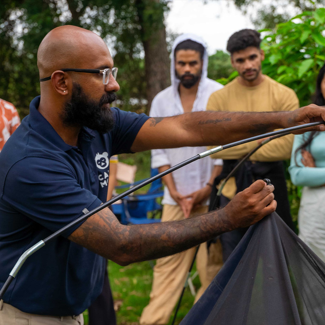 Learn to pitch your tent with help from your guide.